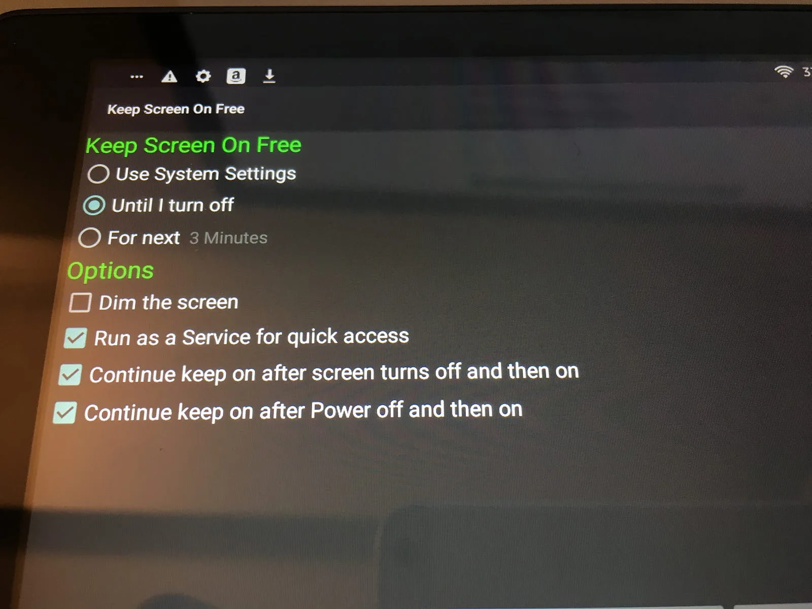 Keep Screen On Free settings set to keep the screen on until turned off, with service options enabled