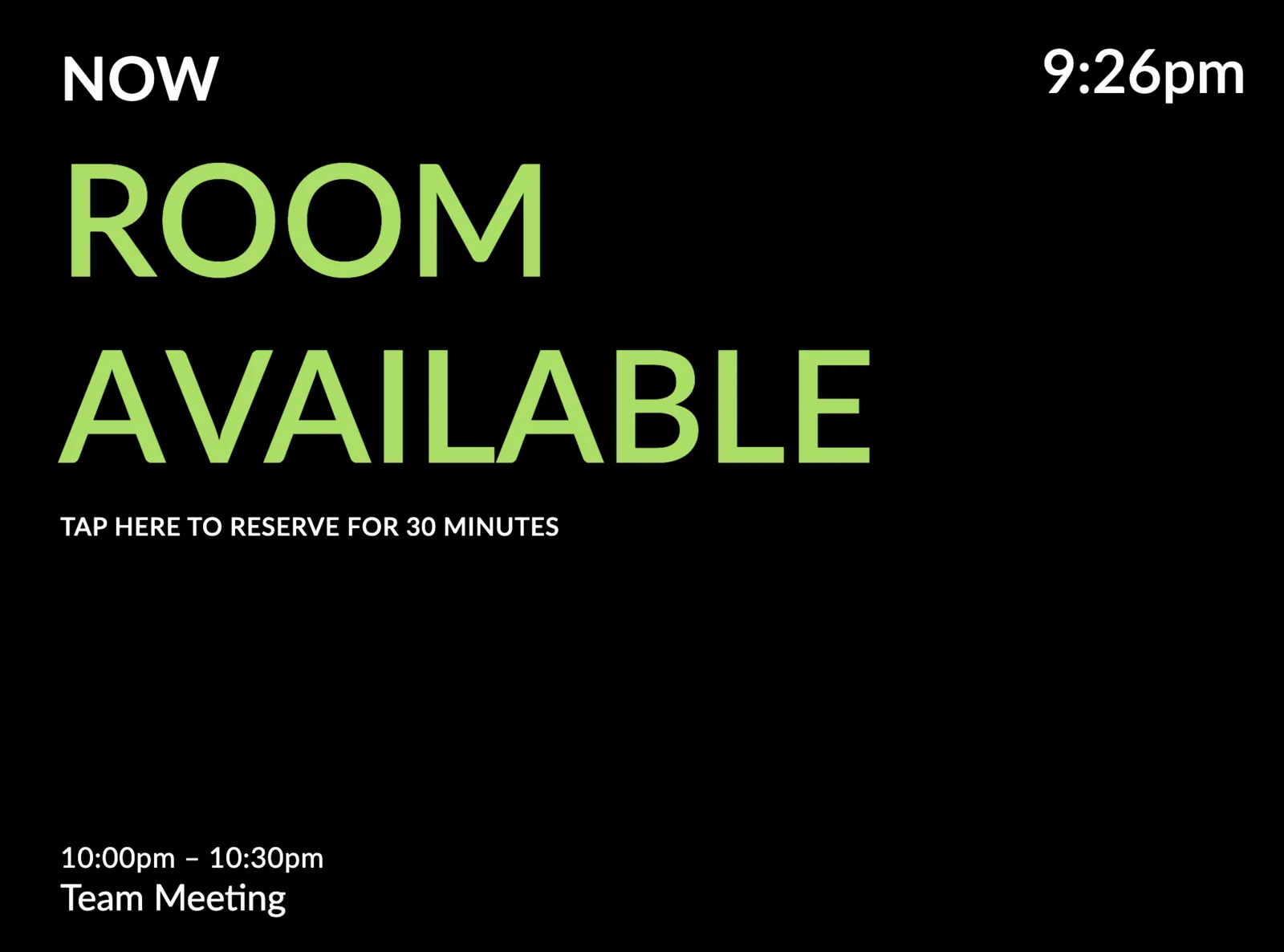 Minimal meeting room display theme showing Room Available in green on a black background