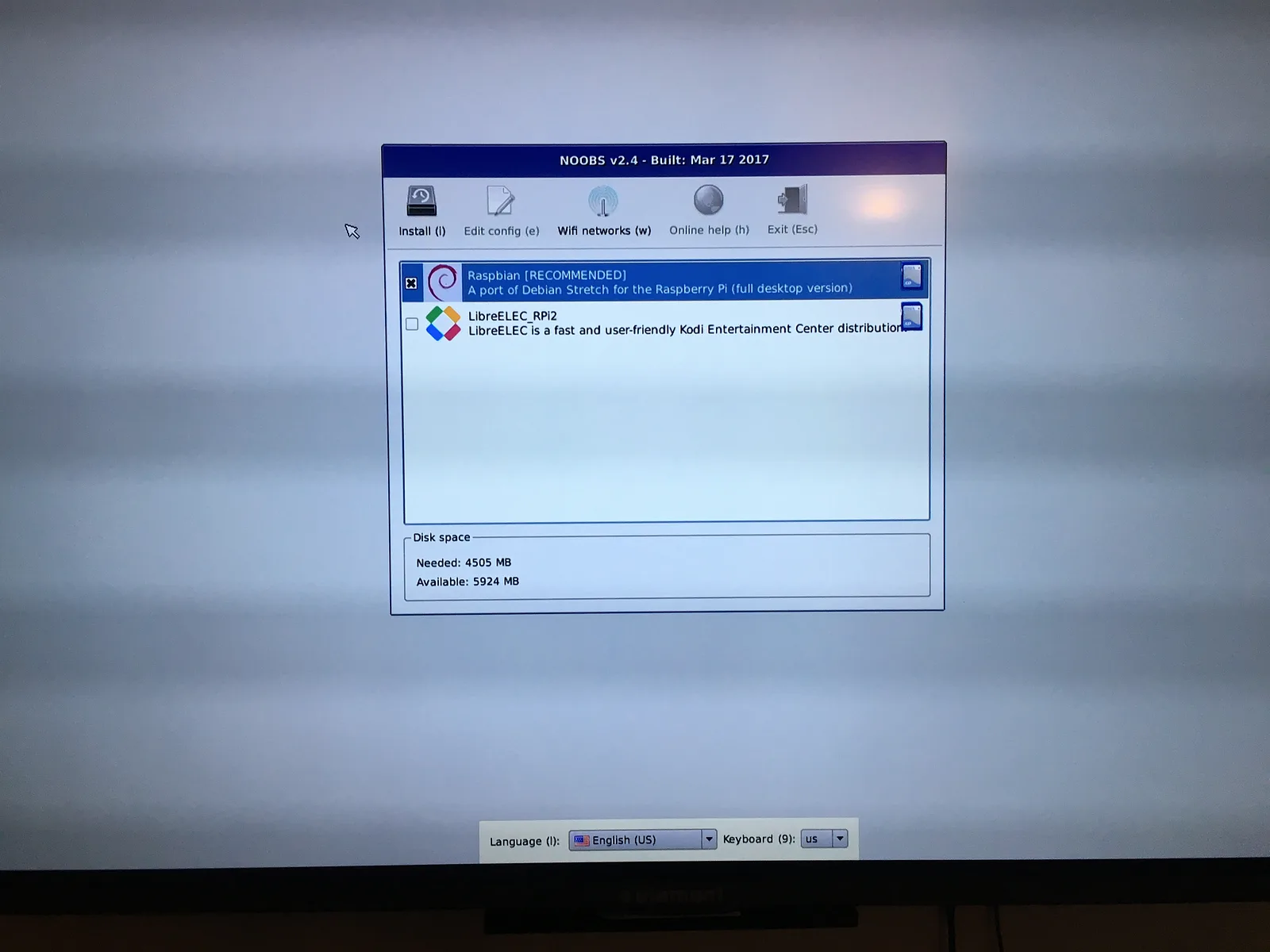 NOOBS installer on a television with Raspbian selected for installation