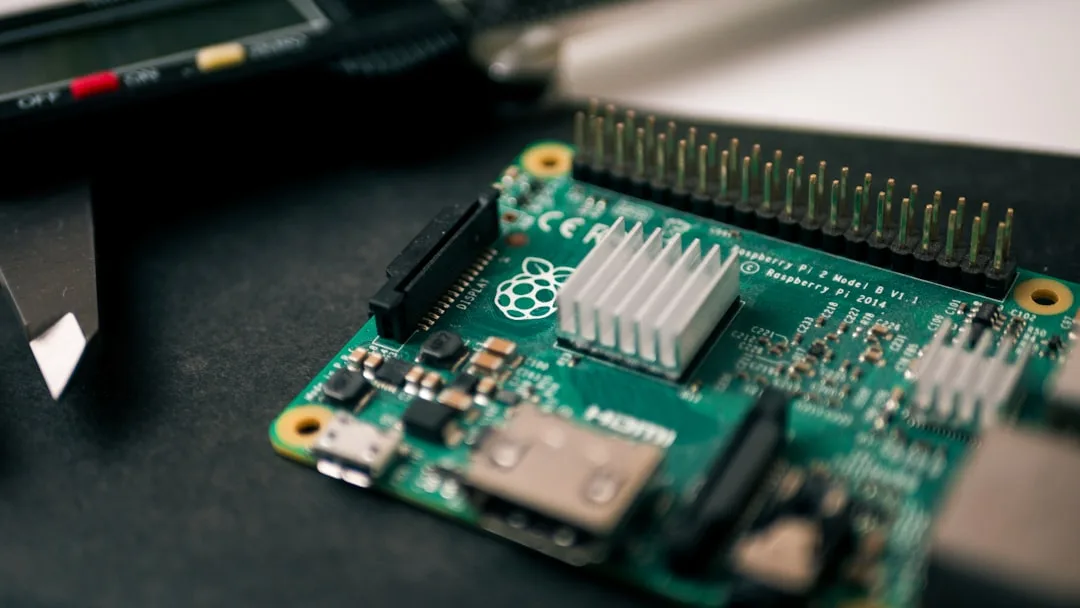 Close up of a Raspberry Pi single board computer with a heatsink and HDMI port