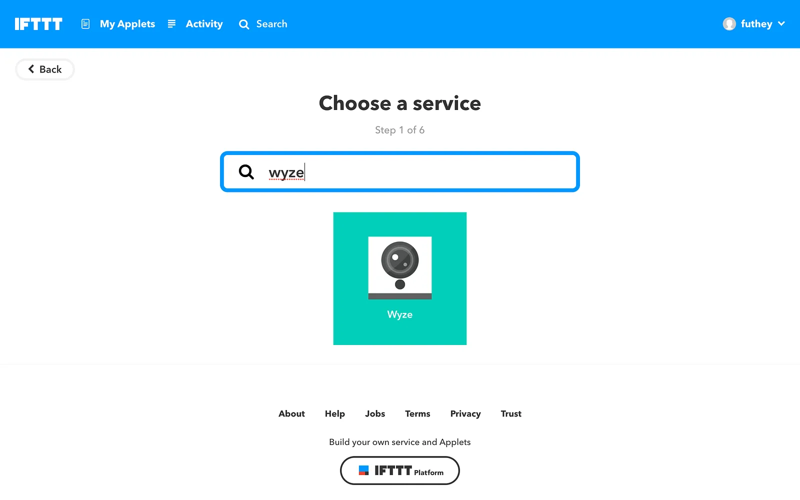 IFTTT choose a service step with Wyze searched and selected
