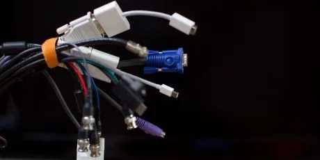 Bundle of assorted display cables including HDMI, VGA, DVI and DisplayPort connectors