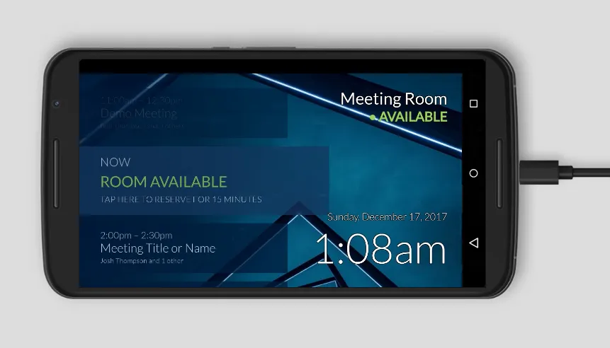 Android phone pinned to the Meeting Room 365 display showing the room available